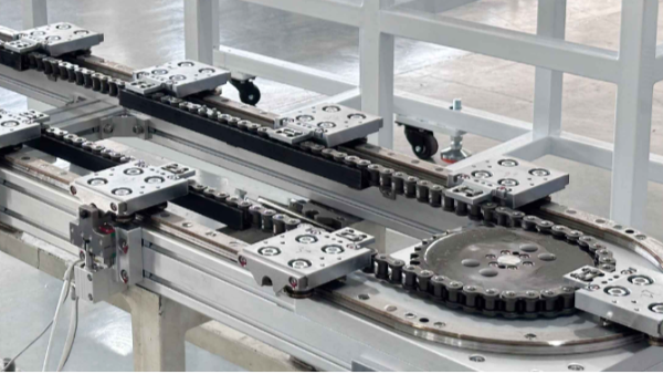 自動化組裝生產(chǎn)線中環(huán)線平臺，為什么更推薦定距鏈條傳動機構？